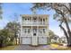 Two story home with double garage and porch at 1075 Capersview Ct, Awendaw, SC 29429
