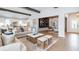 Open living room with hardwood floors and views into the kitchen and home office at 615 Faulkner Dr, Mount Pleasant, SC 29466