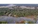 Aerial view showcasing waterfront property with lush greenery and private docks at 615 Faulkner Dr, Mount Pleasant, SC 29466