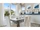 Bright dining room with large windows and a spacious table, perfect for Gathering gatherings at 615 Faulkner Dr, Mount Pleasant, SC 29466