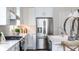 Modern kitchen with white cabinets, stainless steel appliances, and an island at 615 Faulkner Dr, Mount Pleasant, SC 29466