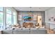 Bright living room with sectional sofa and large windows at 635 Faulkner Dr, Mount Pleasant, SC 29466