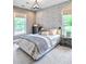 Spacious bedroom with patterned wallpaper and ample natural light at 635 Faulkner Dr, Mount Pleasant, SC 29466