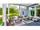 Spacious covered patio furniture and patterned rug at 635 Faulkner Dr, Mount Pleasant, SC 29466
