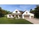 Modern farmhouse exterior with a two-car garage and landscaped yard at 635 Faulkner Dr, Mount Pleasant, SC 29466