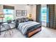 Modern bedroom with brick feature wall and built-in workspace at 635 Faulkner Dr, Mount Pleasant, SC 29466