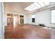 Spacious interior with hardwood floors, high ceilings, and skylights at 354 King St St # B, Charleston, SC 29401