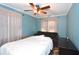 Bright bedroom with a double bed and ceiling fan at 717 Central Ave, Summerville, SC 29483