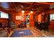 Cozy lounge area with wood paneling and comfortable chairs at 717 Central Ave, Summerville, SC 29483