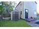 Tan building with black door and small shed in the backyard at 717 Central Ave, Summerville, SC 29483