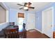 Small dining area with wood floor and light blue walls at 717 Central Ave, Summerville, SC 29483