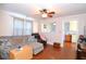 Living room with sectional sofa and hardwood floors at 717 Central Ave, Summerville, SC 29483