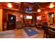 Comfortable lounge with wood-paneled walls and ceiling at 717 Central Ave, Summerville, SC 29483