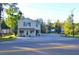 Two-story beige commercial building with parking at 717 Central Ave, Summerville, SC 29483