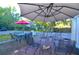 Spacious patio with seating area and large umbrellas at 717 Central Ave, Summerville, SC 29483