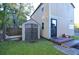 Tan vinyl shed with double doors at 717 Central Ave, Summerville, SC 29483