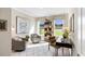 Home office with two armchairs, a desk, and built-in shelving at 4000 Middleton Dr, Goose Creek, SC 29445