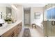 Double vanity bathroom with soaking tub and walk-in shower at 4000 Middleton Dr, Goose Creek, SC 29445