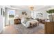 Spacious main bedroom with a king-size bed and sitting area at 4000 Middleton Dr, Goose Creek, SC 29445