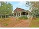 Charming single-story home with a wrap-around porch and landscaped grounds at 117 Silverbell Ln, Hollywood, SC 29470