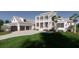 Two-story home with white siding and metal roof at 117 Silverbell Ln, Hollywood, SC 29470