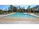 Relaxing community pool with shallow entry and lounge chairs at 117 Silverbell Ln, Hollywood, SC 29470