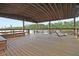 Spacious wooden dock with covered area and swing at 117 Silverbell Ln, Hollywood, SC 29470