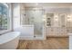 Luxurious bathroom with a soaking tub, walk-in shower, and double vanity at 19 Bradley Pasture Way, Ravenel, SC 29470
