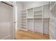 Bright walk-in closet featuring ample shelving and hanging space at 19 Bradley Pasture Way, Ravenel, SC 29470