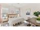 Bedroom with a queen-size bed, window seat, and desk at 1458 Tangles Trl, Charleston, SC 29492