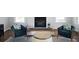 Cozy living room with fireplace and comfortable seating at 1165 Oak Bluff Ave, Charleston, SC 29492