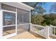 Relaxing screened porch with wooden deck and wooded views at 1165 Oak Bluff Ave, Charleston, SC 29492