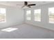 Spacious bedroom with neutral carpeting and multiple windows at 1165 Oak Bluff Ave, Charleston, SC 29492