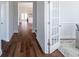 Bright hallway with hardwood floors leading to the living areas at 1165 Oak Bluff Ave, Charleston, SC 29492