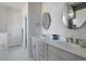 Elegant bathroom with double vanity, large mirror, and tile flooring at 1165 Oak Bluff Ave, Charleston, SC 29492