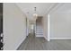 Elegant entryway with hardwood floors and staircase leading to the upper level at 1466 Tangles Trl, Charleston, SC 29492