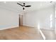 Spacious, unfurnished bedroom with hardwood floors, ample natural light, and neutral walls at 3820 Gnarled Oaks Ln, Johns Island, SC 29455