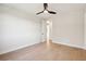 Empty bedroom with hardwood floors, ceiling fan, and open doorway at 3820 Gnarled Oaks Ln, Johns Island, SC 29455