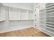 Spacious walk-in closet featuring built-in shelves, hanging rods, and ample storage space at 3820 Gnarled Oaks Ln, Johns Island, SC 29455