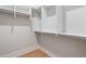 Empty walk-in closet with built-in shelving and hanging rods at 3820 Gnarled Oaks Ln, Johns Island, SC 29455