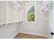 Spacious walk-in closet with built-in shelving and natural light at 3820 Gnarled Oaks Ln, Johns Island, SC 29455
