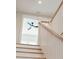 Staircase with white banister and light oak wood steps at 3820 Gnarled Oaks Ln, Johns Island, SC 29455