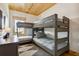 Bedroom featuring two sets of bunk beds, ideal for families at 6500 Parkers Ferry Rd, Adams Run, SC 29426