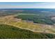 Aerial view of vast wetlands with cultivated areas at 6500 Parkers Ferry Rd, Adams Run, SC 29426