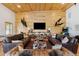 Spacious game room with a large TV, comfortable seating and wood walls at 6500 Parkers Ferry Rd, Adams Run, SC 29426