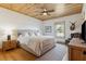 Bedroom with wood ceiling and large window at 6500 Parkers Ferry Rd, Adams Run, SC 29426