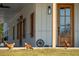 Front entrance with three chickens in the foreground at 6500 Parkers Ferry Rd, Adams Run, SC 29426