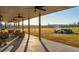 Spacious covered patio overlooking a large backyard at 6500 Parkers Ferry Rd, Adams Run, SC 29426