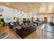 Game room features leather sofas, a pool table, and a wood ceiling at 6500 Parkers Ferry Rd, Adams Run, SC 29426