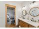 Bathroom with double vanity and walk-in shower at 6500 Parkers Ferry Rd, Adams Run, SC 29426
